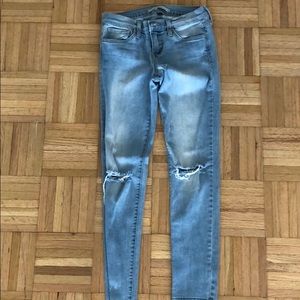 Medium wash ripped denim